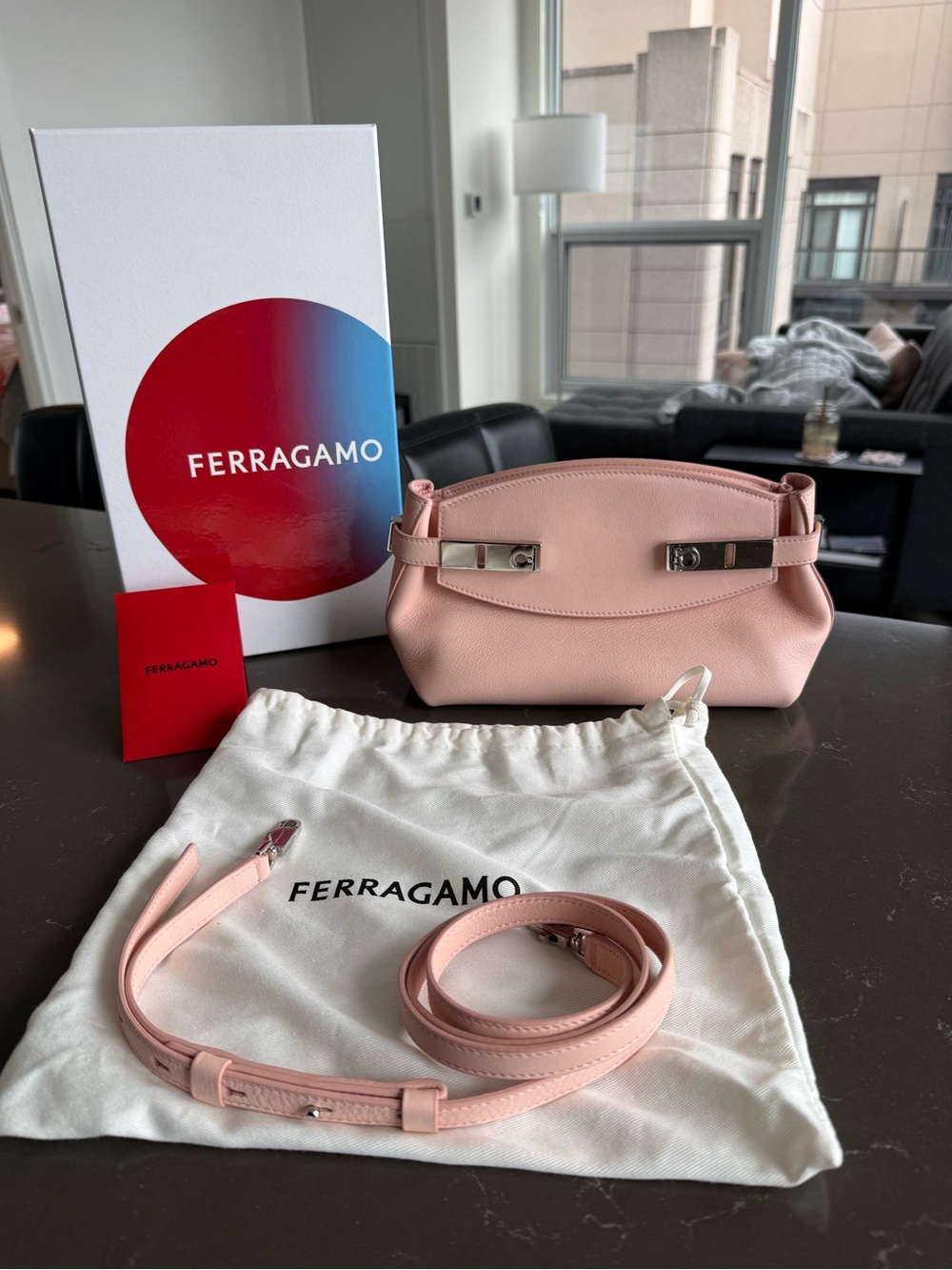 Salvatore Ferragamo small hug leather clutch